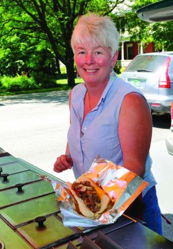 Julie Roy has been selling hot dogs from a cart in downtown Waterbury for 15 years.