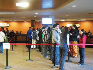 Season-pass buyers line up at the Spruce Base Camp on Saturday, the final day of preseason discounts. Many buyers then headed up the FourRunner Quad to take some turns on Season Pass Appreciation Day.