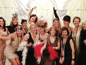 Attendees sport 1920s-style fashions at the Helen Day Art Center’s Great Gatsby Gala.