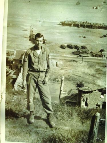 Leonard Pilus of Essex Junction on the bluffs above Omaha Beach several weeks after the Normandy invasion.