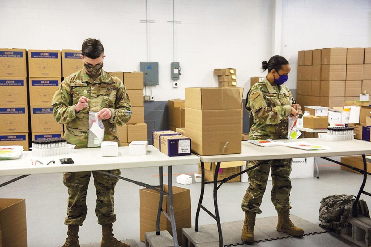 U.S. Air Force Senior Airmen Lucas Wysock and Technical Sgt. Christina McGill