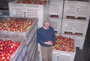 Paul Brown, owner of Cold Hollow Cider Mill in Waterbury Center, in the cold storage area of the mill.