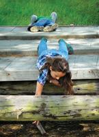 Kids hunt for insects during a summer day-camp program offered by the Stowe Recreation Department.
