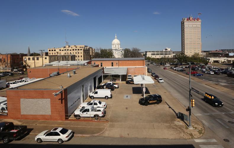 Magnolia lodging firm contracts to buy county garage near Shrine building