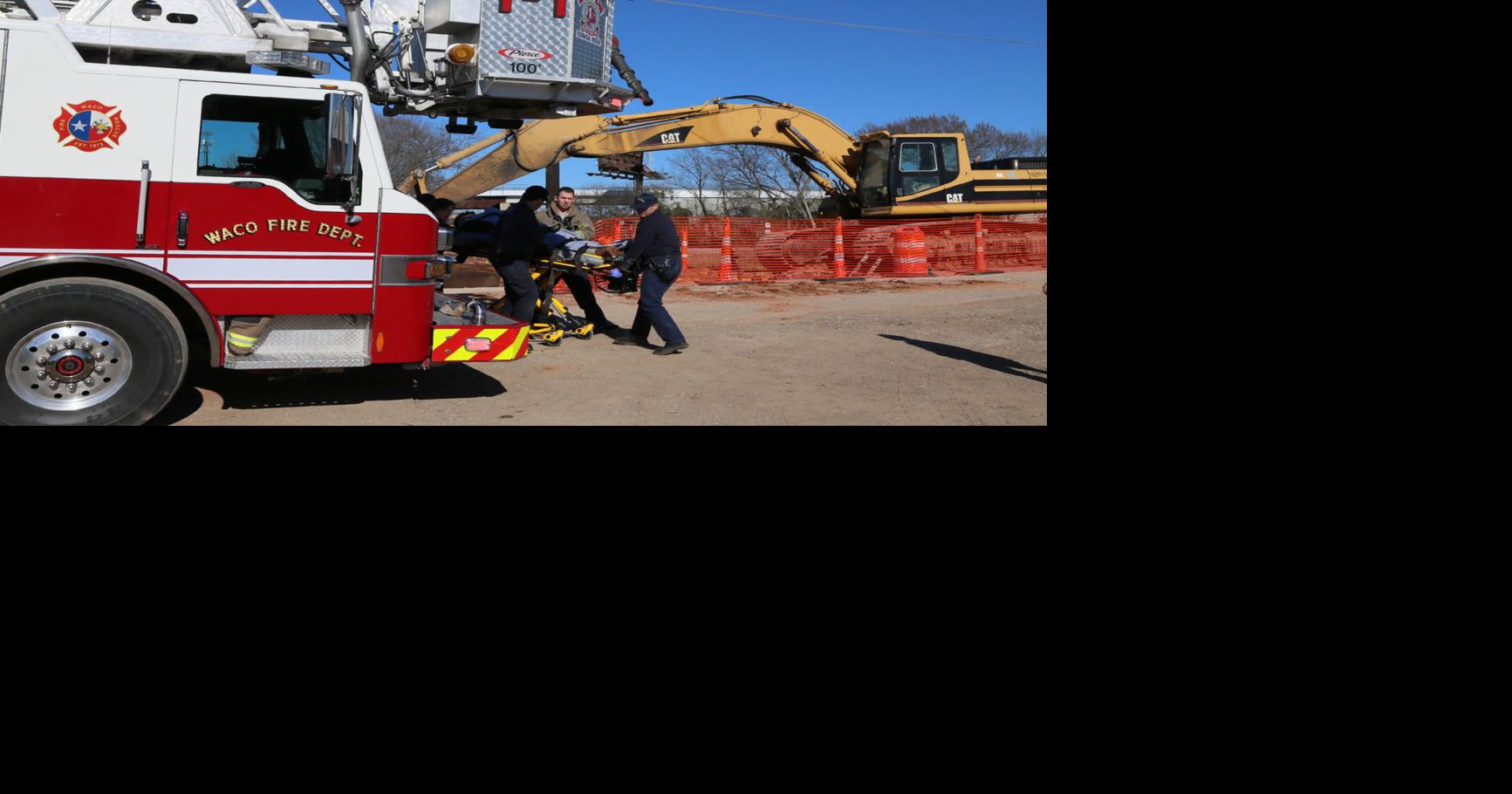 Firefighters rescue worker who fell into trench