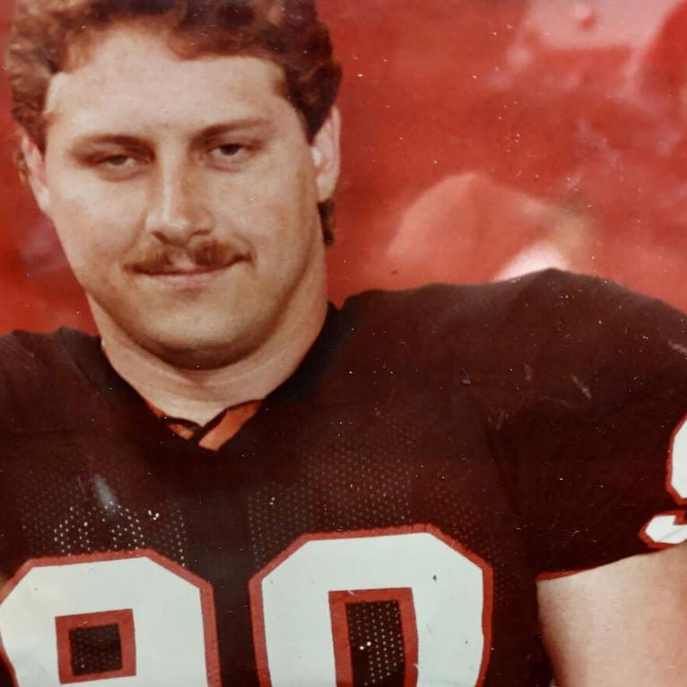 Van Hughes' family donates helmets to Axtell football team