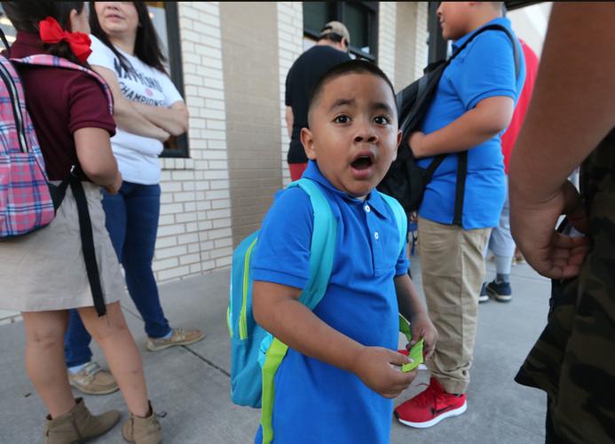 Waco, Tx News  Big Binky gives away school supplies to kids