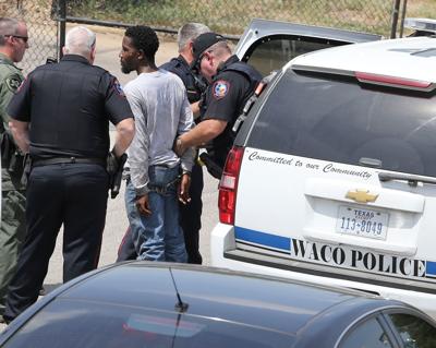 police employee city officer waco wacotrib take ronald custody turner fought tried allegedly lewis he into after