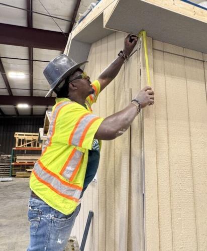 Father attends Building Construction program with son
