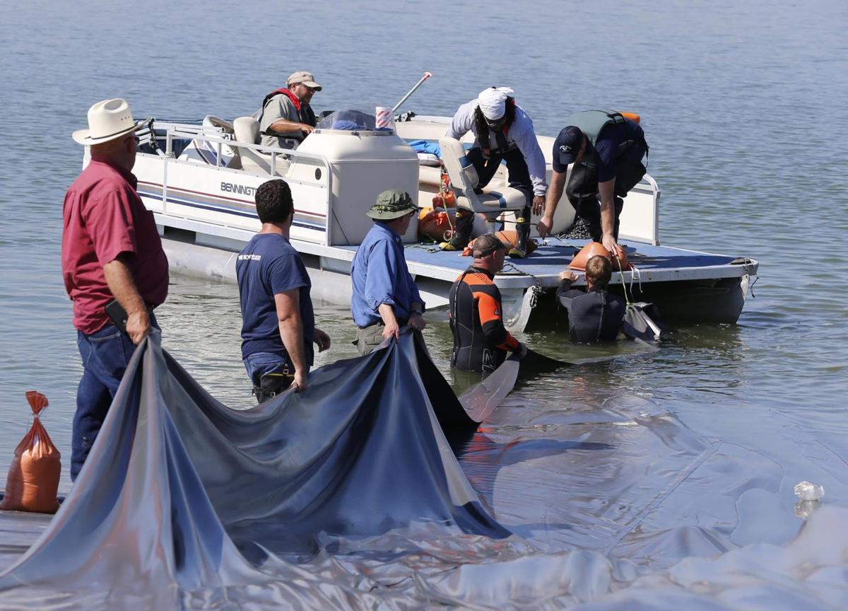 Divers, crews fight Lake Waco zebra mussels with huge tarps Environment