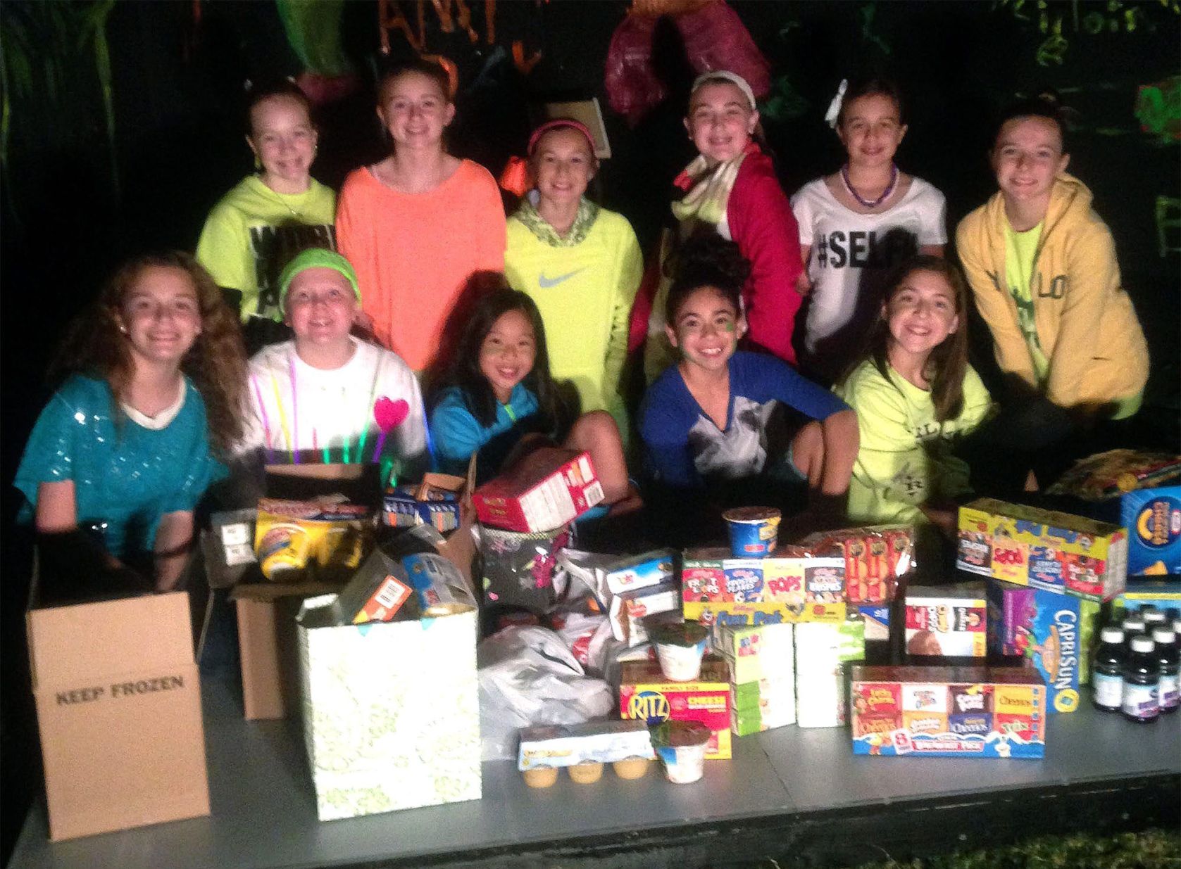 Girls bring food for hungry instead of birthday gifts