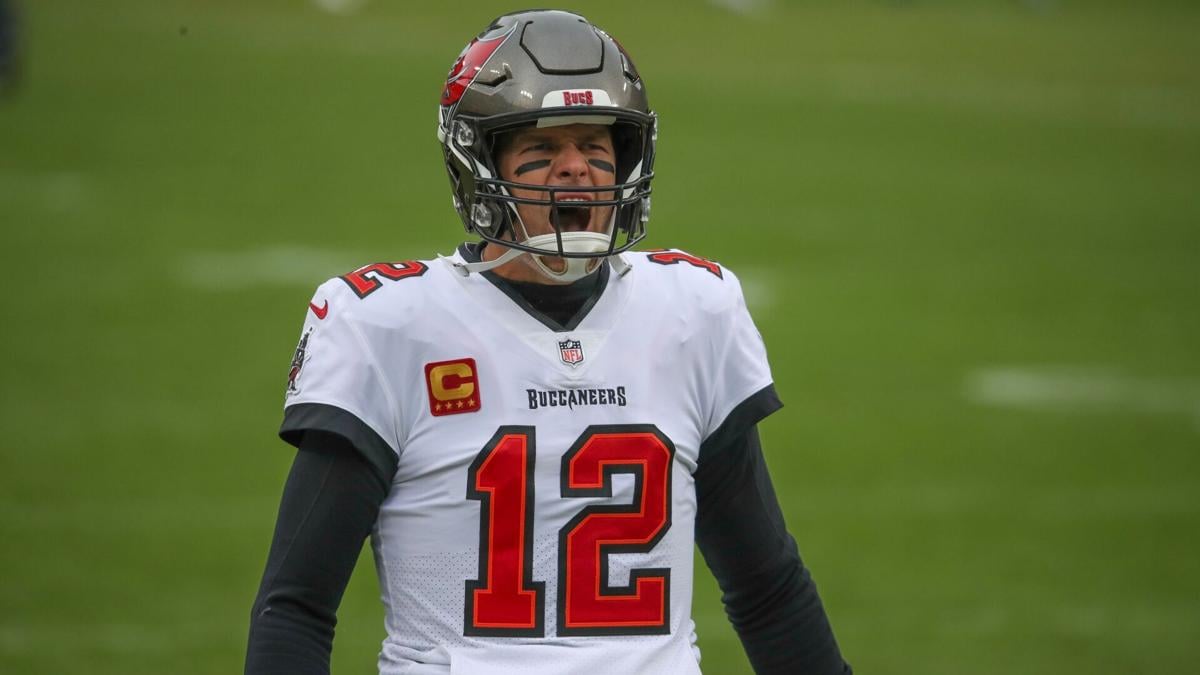 Tampa Bay Buccaneers quarterback Tom Brady takes the field before the NFC Championship game against the Green Bay Packers on Sunday, Jan. 24, 2021, in Green Bay, Wis..