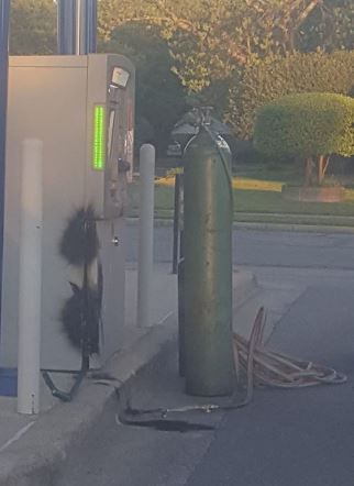 Police seek masked men who tried to cut into ATM with torches
