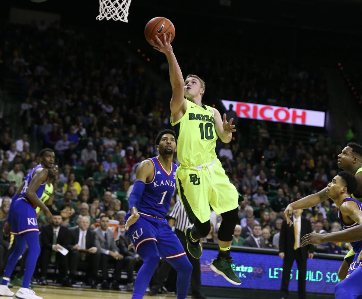 Kansas Hangs On For 73 68 Win Over Short Handed Bears Baylor
