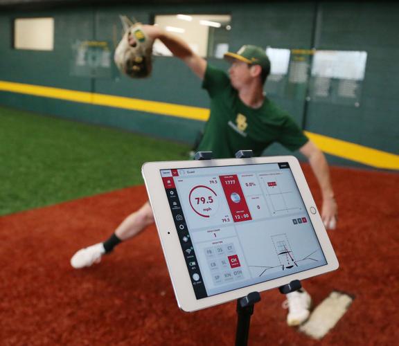 College baseball goes high-tech to send pitch calls to mound