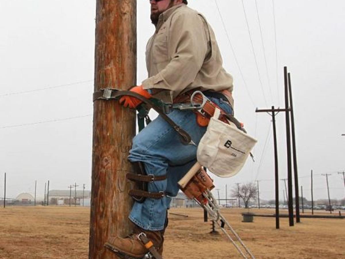 The Right Gear In Line What Electrical Linemen Carry On The Climb
