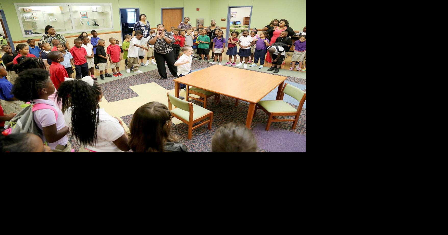 Peaches Henry Waco ISD Board of Trustees, sign the contract to keep