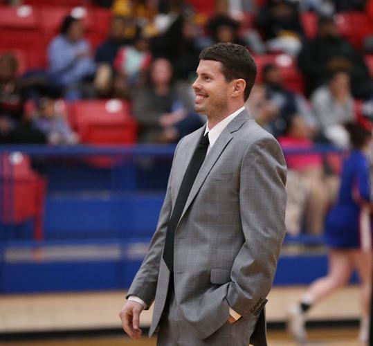 Love and basketball Midway's fatherson coaching tandem imparting