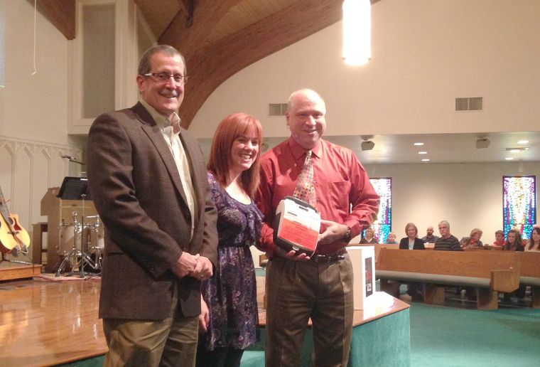 Defibrillator donation to West church