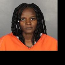 Woman accused of stabbing with scissors arrested