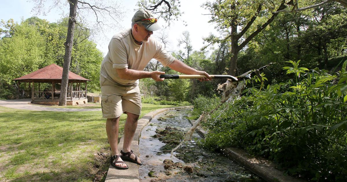 Volunteers chip away at restoring Proctor Springs