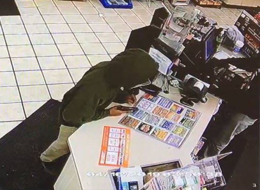 Police search for man who robbed convenience store at gunpoint