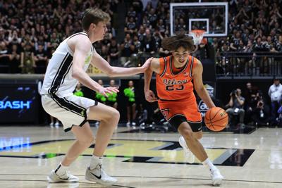 Illinois' Keaton Wagler drives against Purdue's Daniel Jacobsen during the first half at Mackey Arena on Saturday, Jan. 24, 2026, in West Lafayette, Indiana.