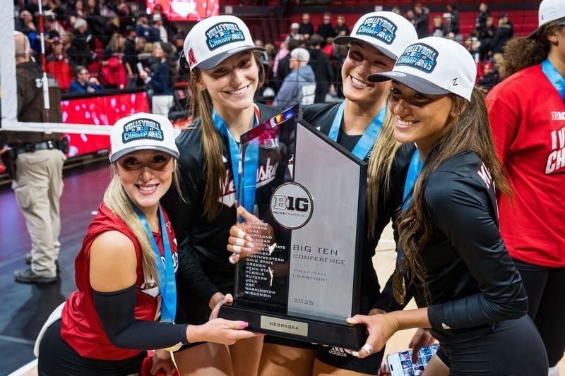 Nov 28, 2025; Lincoln, Neb, USA; Nebraska Cornhuskers libero Laney Choboy (6), setter Bergen Reilly (2), middle blocker Andi Jackson (15) and outside hitter Harper Murray (27) pose with the 2025 Big Ten Volleyball Champions trophy after the match agains...