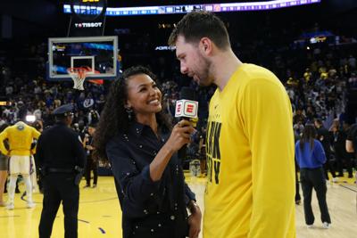 ESPN reporter Malika Andrews interviews Los Angeles Lakers forward/guard Luka Doncic after the game against the Golden State Warriors at Chase Center.