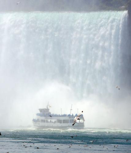 A view of Niagara Falls from the air, by boat and on foot