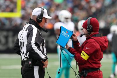NFL referee Bill Vinovich watches a replay during the first half of a game on Dec. 7, 2025, at MetLife Stadium in East Rutherford, New Jersey.
