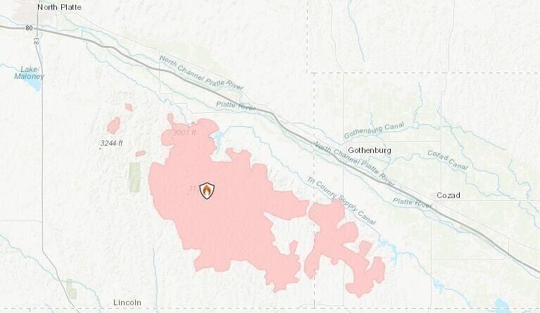 Winds calm, temperatures cool as firefighters days' old battle continues with three major fires