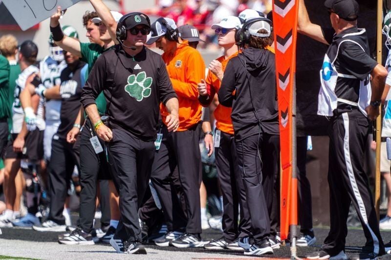 Sep 5, 2026; Lincoln, Nebraska, USA;  Ohio Bobcats head coach John Hauser walks along the sideline during the third quarter against the Nebraska Cornhuskers at Memorial Stadium.  Mandatory Credit: Dylan Widger-Imagn Images