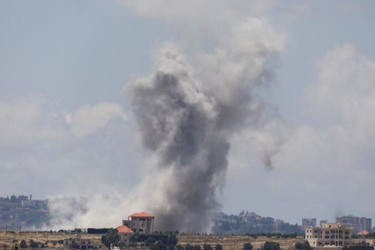Smoke billows from southern Lebanon following an Israeli strike, as seen from Marjayoun