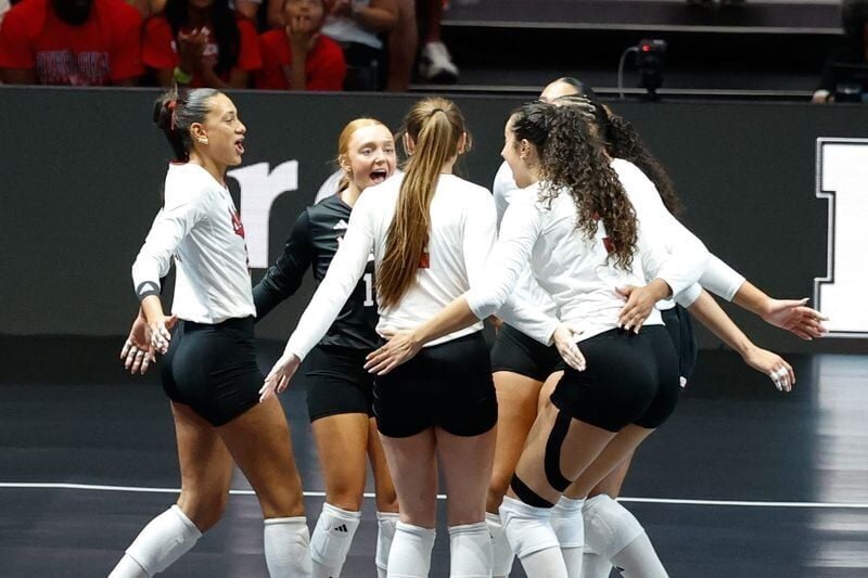 Aug 27, 2026; Arlington, TX, USA;  Nebraska Cornhuskers players celebrate a point during their volleyball match against the Florida Gators at AT&T Stadium.  Mandatory Credit: Chris Jones-Imagn Images