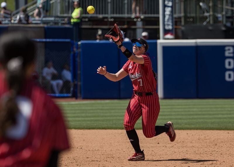 May 31, 2026; Oklahoma City, OK, USA; Nebraska Cornhuskers infielder Ava Kuszak (7) makes a catch in the infield for an out in the fifth inning against the Texas Longhorns during the NCAA Women’s College World Series at Devon Park. Mandatory Credit: Bre...