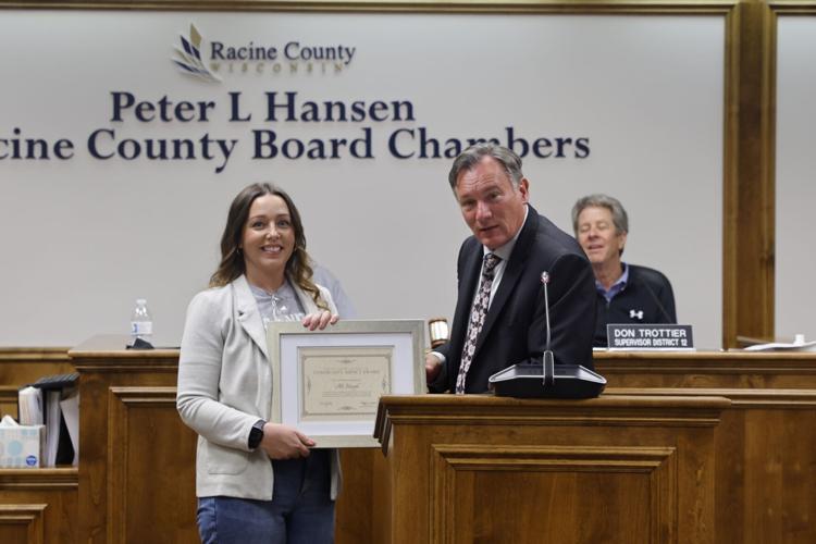 Ali Haigh receives Community Impact Award