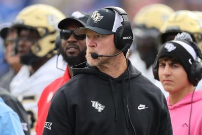 Nov 29, 2025; Provo, Utah, USA; UCF Knights head coach Scott Frost watches play against the BYU Cougars during the second half at LaVell Edwards Stadium. Mandatory Credit: Rob Gray-Imagn Images