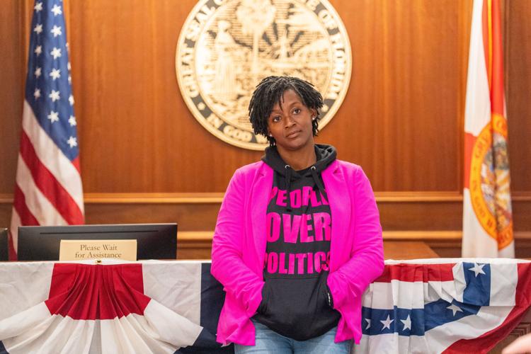 Rep. Angie Nixon listens as an officer explains what will happen if she stays in the Governor’s office after hours after she staged a sit-in Friday, May 15, 2026. Nixon wants to speak with Gov. Ron DeSantis regarding redistricting and is calling for anot