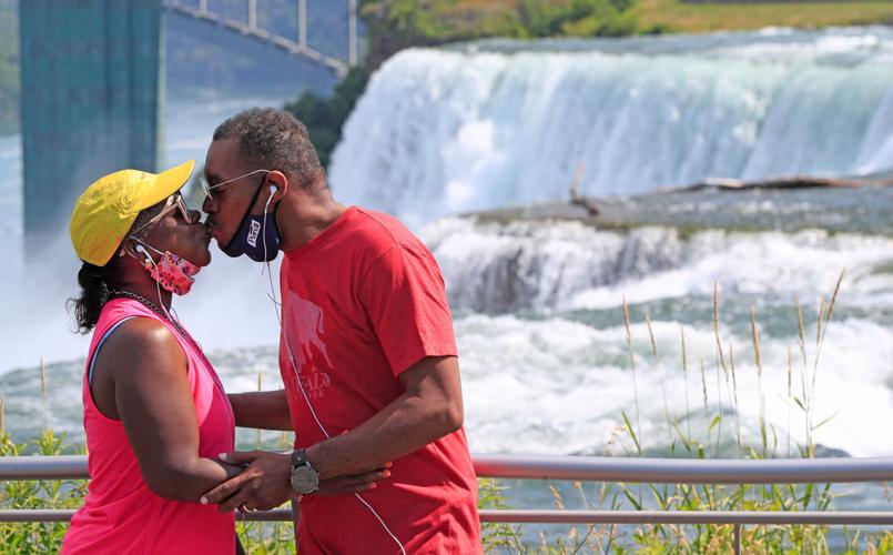 A view of Niagara Falls from the air, by boat and on foot