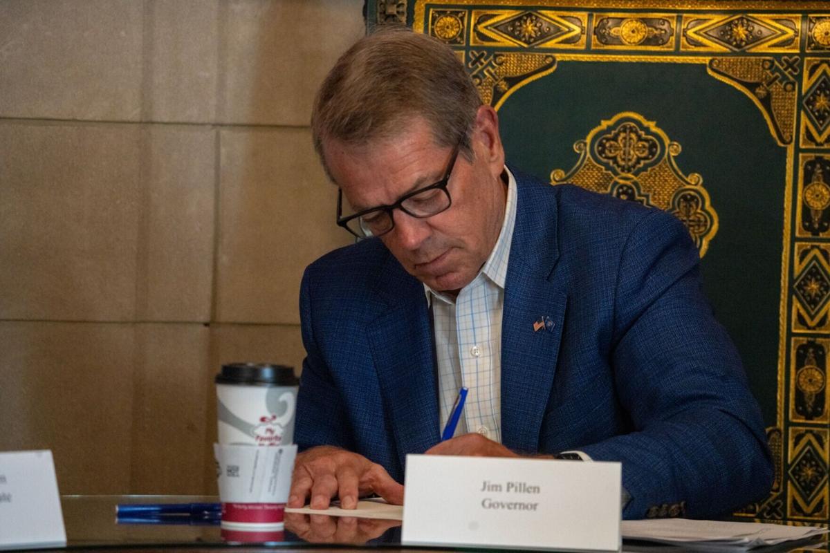 Jim Pillen signs (single-use photo)