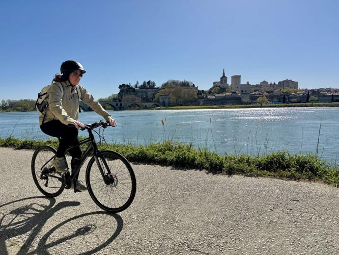One of the few Lumiere passengers who braved the gusty winds to ride a bike in Avignon.