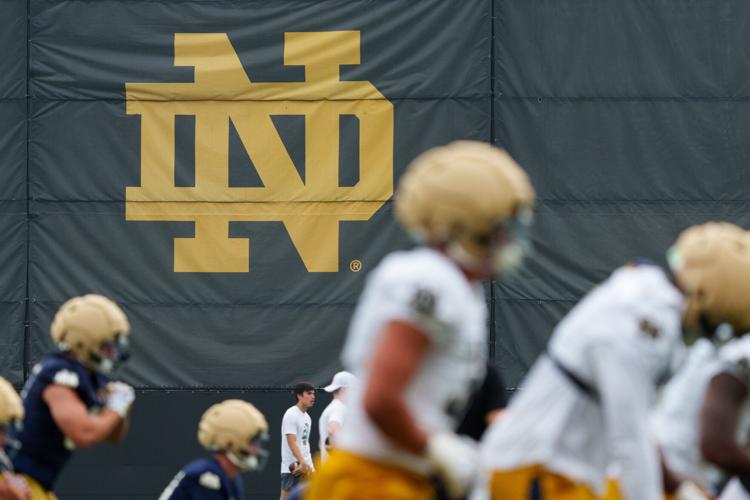 Players warm up during a Notre Dame football practice at Irish Athletic Center on Thursday, Aug. 6, 2026, in South Bend.