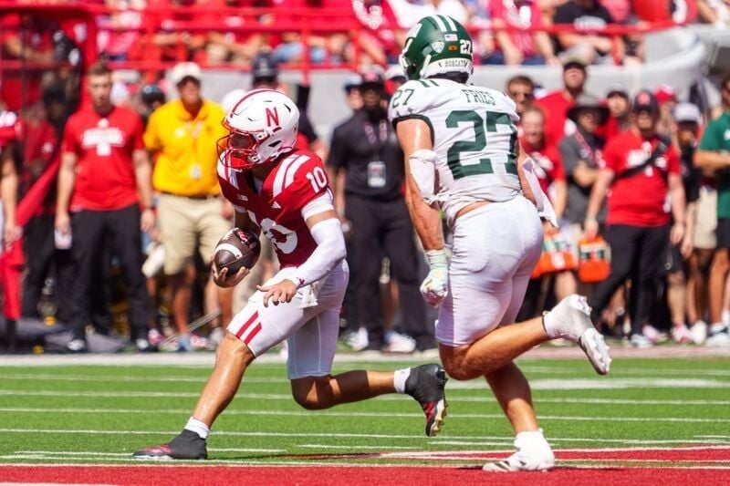 Sep 5, 2026; Lincoln, Nebraska, USA;  Nebraska Cornhuskers quarterback Anthony Colandrea (10) runs against Ohio Bobcats linebacker Jack Fries (27) during the second quarter at Memorial Stadium.  Mandatory Credit: Dylan Widger-Imagn Images