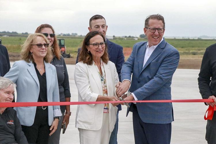 Sen. Deb Fischer and Rep. Adrian Smith celebrate WNRA taxiway extension with a ribbon-cutting ceremony