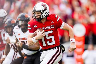 Will Hammond of the Texas Tech Red Raiders runs the ball during the first half against the Oklahoma State Cowboys at Jones AT&T Stadium on Oct. 25, 2025, in Lubbock, Texas.