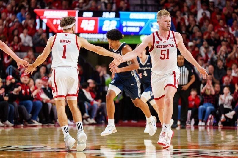 Dec 7, 2025; Lincoln, Nebraska, USA; Nebraska Cornhuskers guard Sam Hoiberg (1) and forward Rienk Mast (51) high five after a three-point basket by Mast against the Creighton Bluejays during the second half at Pinnacle Bank Arena. Mandatory Credit: Dyla...