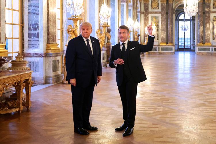 FILE PHOTO: U.S. President Donald Trump receives a tour of Chateau de Versailles from President of France Emmanuel Macron