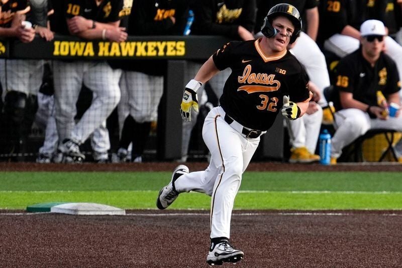 Iowa catcher Reese Moore (32) rounds first base after getting a hit against Bradley April 16, 2025 at Duane Banks Field in Iowa City, Iowa.