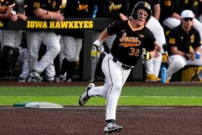 Iowa catcher Reese Moore (32) rounds first base after getting a hit against Bradley April 16, 2025 at Duane Banks Field in Iowa City, Iowa.